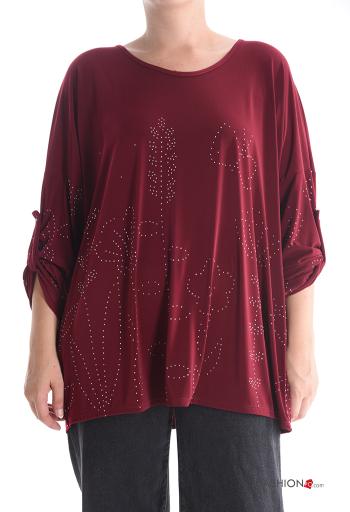Tunic with buttons with rhinestones