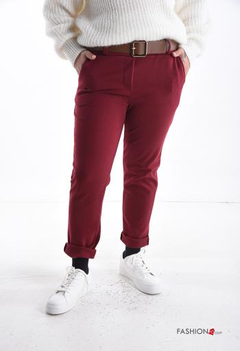 Calças com bolsos com botões com fecho